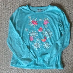 A long sleeved pajama shirt